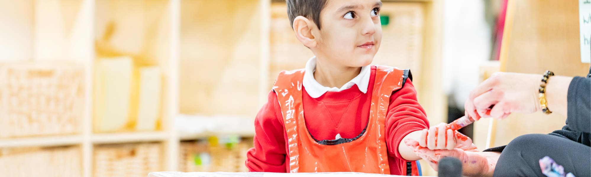 Pupil at St Thomas's CE Primary School painting
